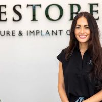 Restore Denture and Implant Center: Dr. Alyssa Mencini, DMD ico