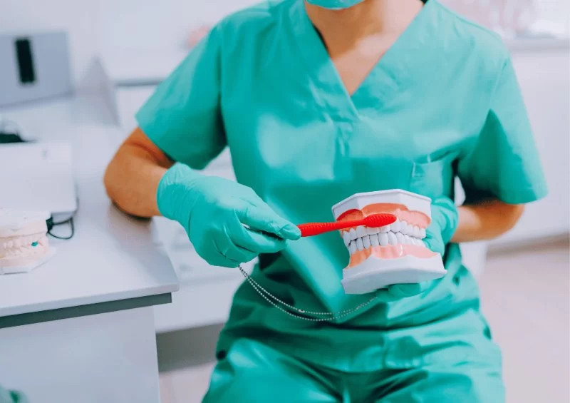A Nurse Is Reviewing Oral Hygiene Practices for Better Health