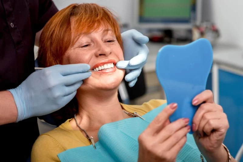 Best Dental Care Tips for Seniors with Dentures and Implants